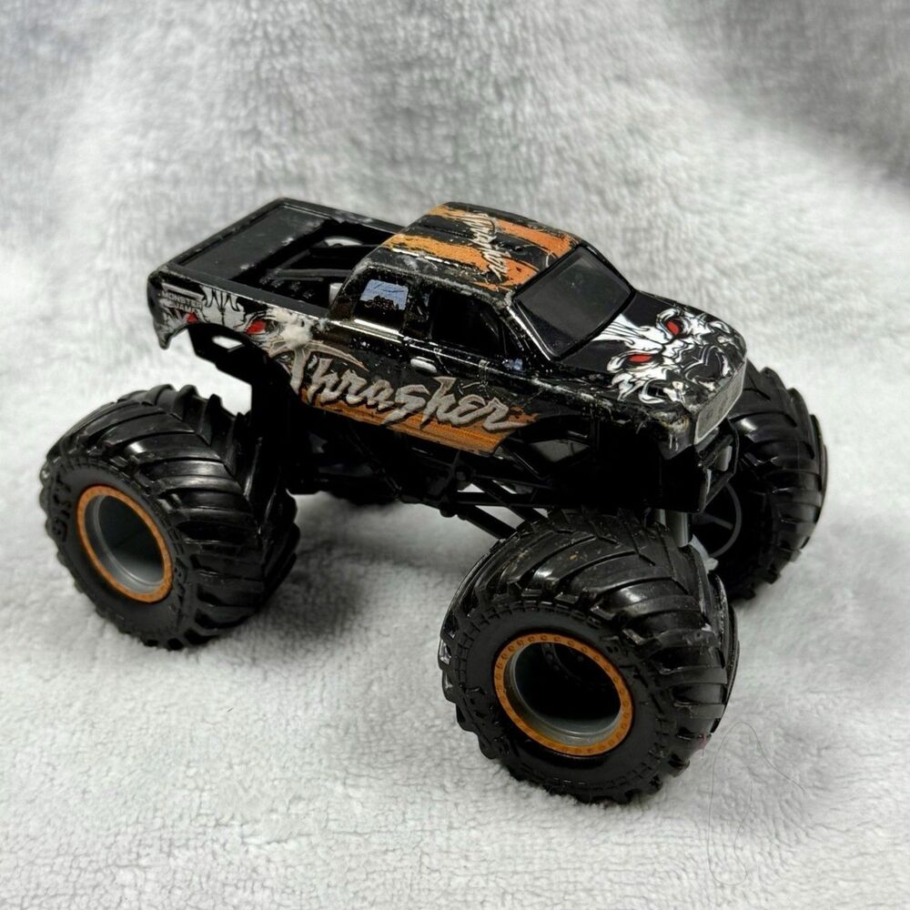 Monster Jam Thrasher Toyota Evo Loose Truck HTF 1/64 Diecast Pickup Orange